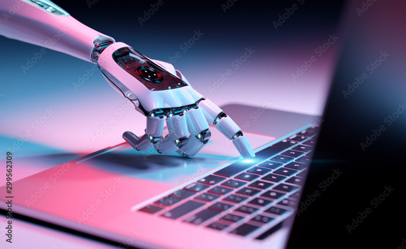 robot hand typing on a notebook
